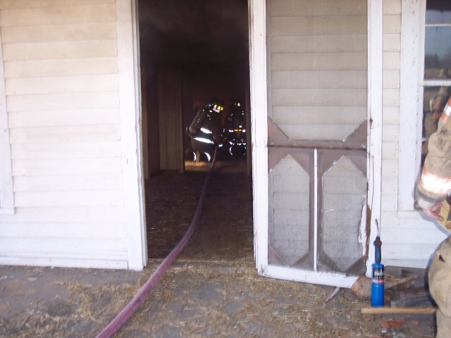 Crews preparing for the firstt of many fires in this old house on Barry Oak Rd