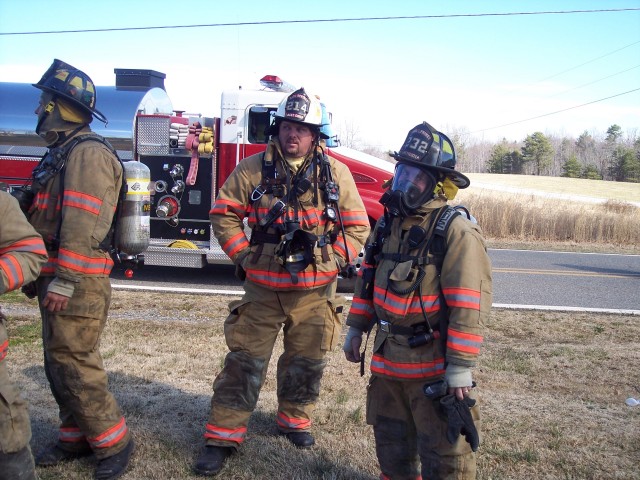 Asst. Chief Todd Bowers and Firefighter (now Captain) Mike Maine wait their turn